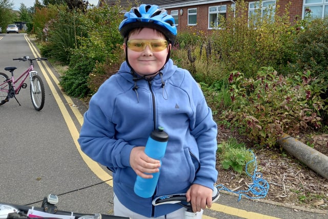Henry Radford, aged 11, rode an impressive 28-mile route to raise £750 for the hospice.