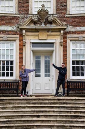 Property Operations Manager Rachel Marriott and Welcome Manager Rob Wilson in front of Gunby Hall.