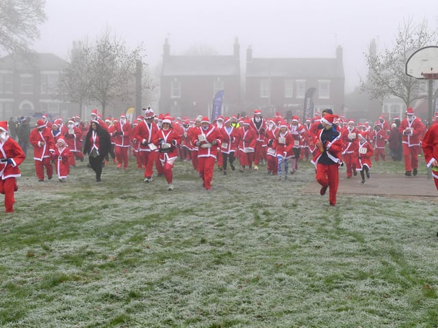 Action from this year's Boston Santa Run.