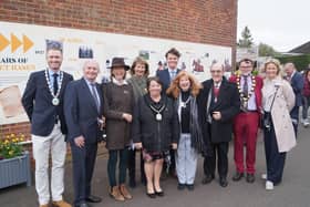 Racecourse general manager Jack Pryor, fifth from left, chairman Sue Lucas far right, committee members and civic dignitaries at the centenary celebration