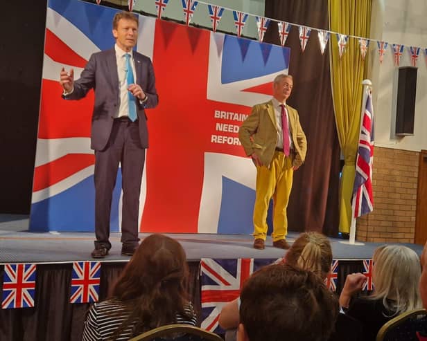 Richard Tice (left) and Nigel Farage take the stage at Old Leak Community Hall.