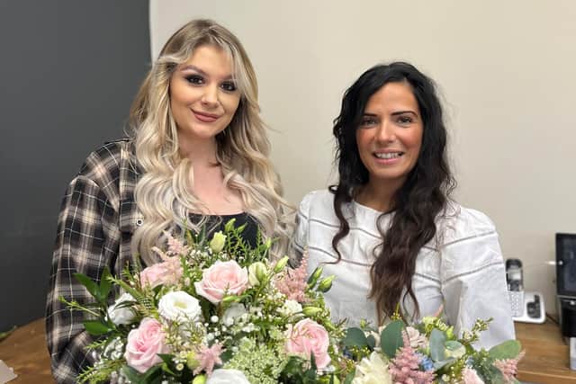 Abby Millis, senior floral designer and supervisor and Laura Bellamy, director