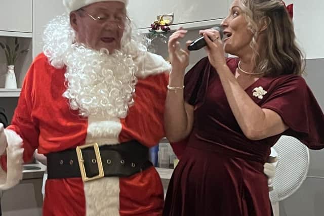 Santa, Rob Welensky and Amanda Willis from The Dream Belles at HC-One’s Elmwood House Care Home