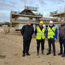 Coun William Gray (second right) with Acis representatives at The Wallis House site in Louth.