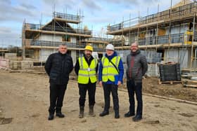 Coun William Gray (second right) with Acis representatives at The Wallis House site in Louth.