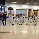 The dance academy in final rehearsals and INSET - dance ambassador Robin Windsor on a previous visit.