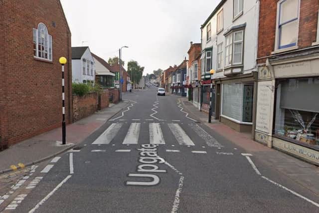 The pedestrian crossing on Upgate - prior to the damage to the light and graffiti. Photo: Google Maps