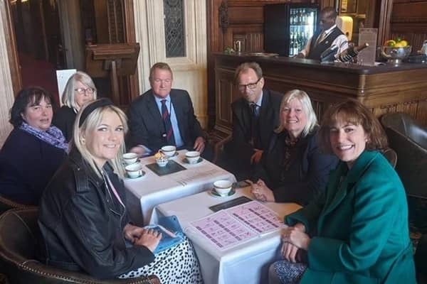 Victoria Atkins MP (right) with the Bob's Brainwaves committee in Parliament.