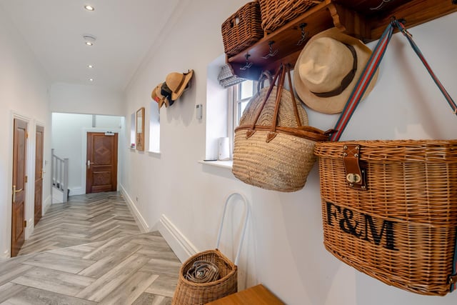 The hallway leading to the garage.