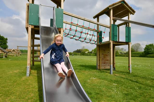 Beau Penny, aged two, tests the slide.