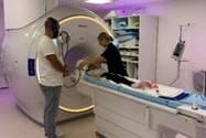 Radiographer Helen conducts the MRI scan on Phoebe.