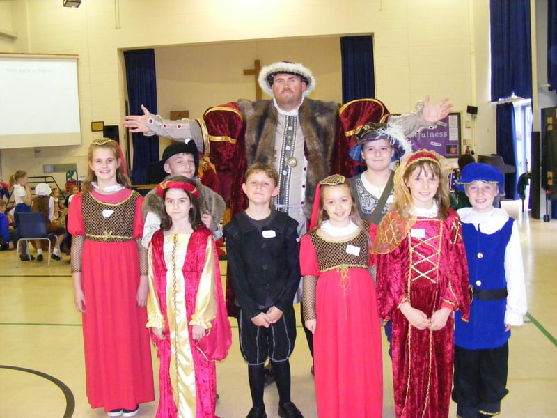 Youngsters at St Botolph’s CofE Primary School, Quarrington, playing host to Henry VIII (played by Neil Bakewell), as part of a day of activities inspired by the Tudor period.