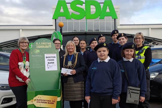 Asda Boston's Store manager, Adele Bayfield-Knight (left), Mayor of Boston, Coun Anne Dorrian, with Boston Sea Cadets, Boston Police Cadets and Boston’s Neighbourhood Policing Team.