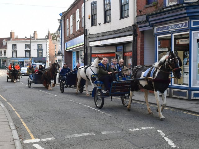 The horse and carriage riders from Didi Riders And Drivers arrive in Horncastle to collect food donations for the town's community larder.