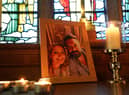 Candles are lit around a photo of Nicola Bulley (left) and her partner Paul Ansell on an altar at St Michael's Church in St Michael's on Wyre, Lancashire, as police continue their search for the missing mother of two.