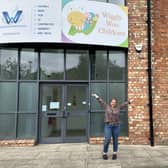 Rachel outside her new premises