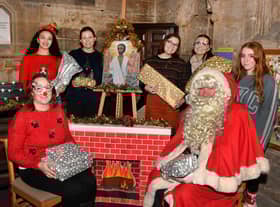 St Georges Academy students at St Denys' Church, from left - (front) Principal Laranya Caslin and Santa (back) Ranya Tran,  Katie Turner,  Ella Gibson,  Grace Simpson and Charlotte Whitelaw.