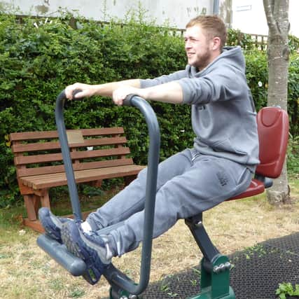 A client testing out the new gym at the lifehouse.