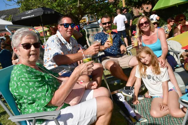 Cheers! Pictured (from left) are Margaret Mahoney, Robert Mahoney, Ray Holland, Jane Holland, Sofia Holland 9, of Skegness