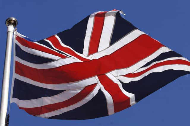 The Union Flag flies at the Queen Elizabeth II Centre in Westmister, central London