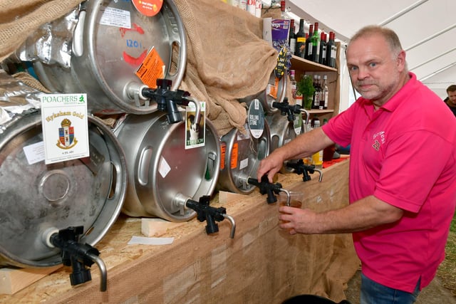 One of the Scredfest organisers, behind the bar, Ian Metcalfe