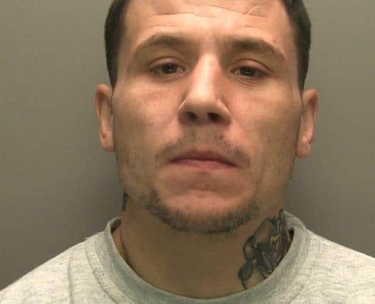 Robert Burton, 34, is wanted on recall to prison.