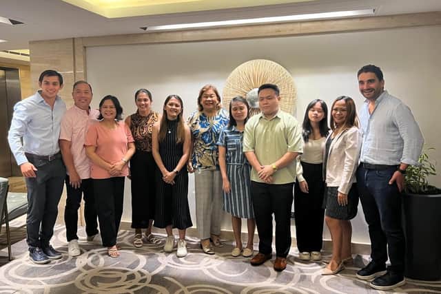 Aaron and Hugo with Home From Home Care staff from the Philippines.