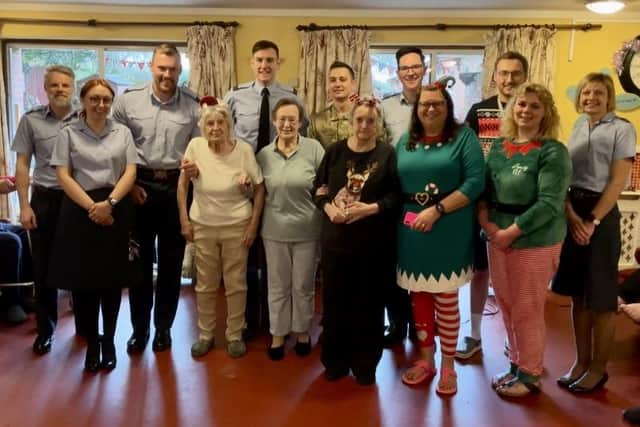 ​Ashdene residents and staff with personnel from RAF Cranwell. Photo supplied