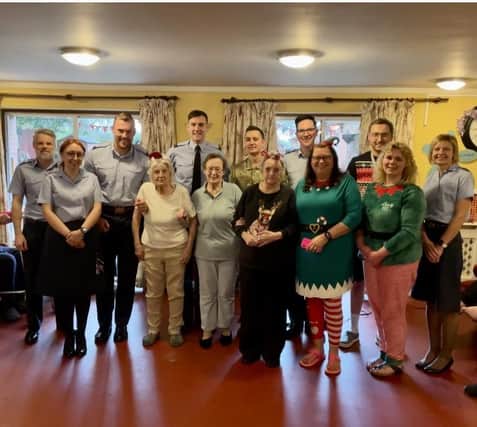​Ashdene residents and staff with personnel from RAF Cranwell. Photo supplied