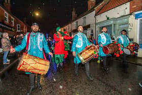 Drummers  from Punjabi Roots Academy adding extra colour to the streets of Spilsby during a light parade.