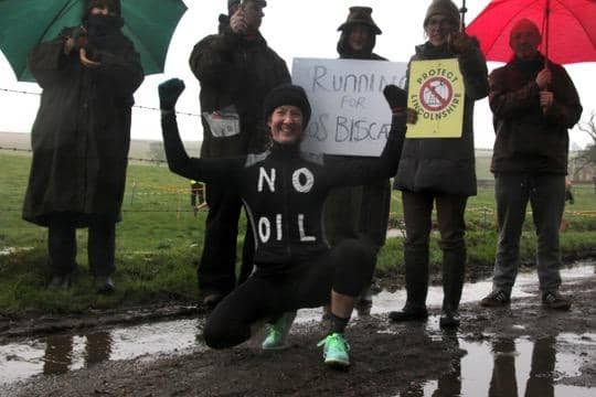 Runner Han Smith shows her backing for the SOS Biscathorpe campaign group during the Lincolnshire Cross-Country Championships.