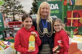 Mayor, Coun Anne Dorrian pictured with youngsters who were supporting the collections drive for Boston Food Bank.