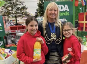 Mayor, Coun Anne Dorrian pictured with youngsters who were supporting the collections drive for Boston Food Bank.