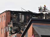 The scene on Wednesday in London Road, following the previous day's fire.