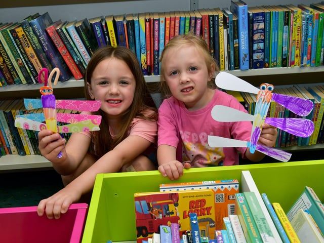 L-R Emily Hewitt 6 and Clara Hewitt 4 of Ruskington enjoying Sleaford library craft activities for RiverLight.