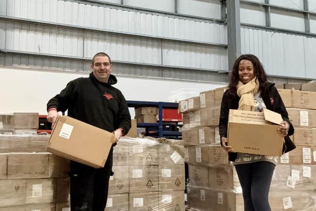 Lorraine and Lee Lewis with some donated stock.