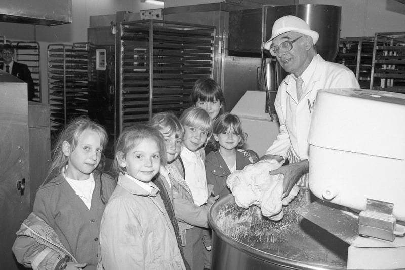 Asda deputy bakery manager Charlie Broughton with Carlton Road pupils.