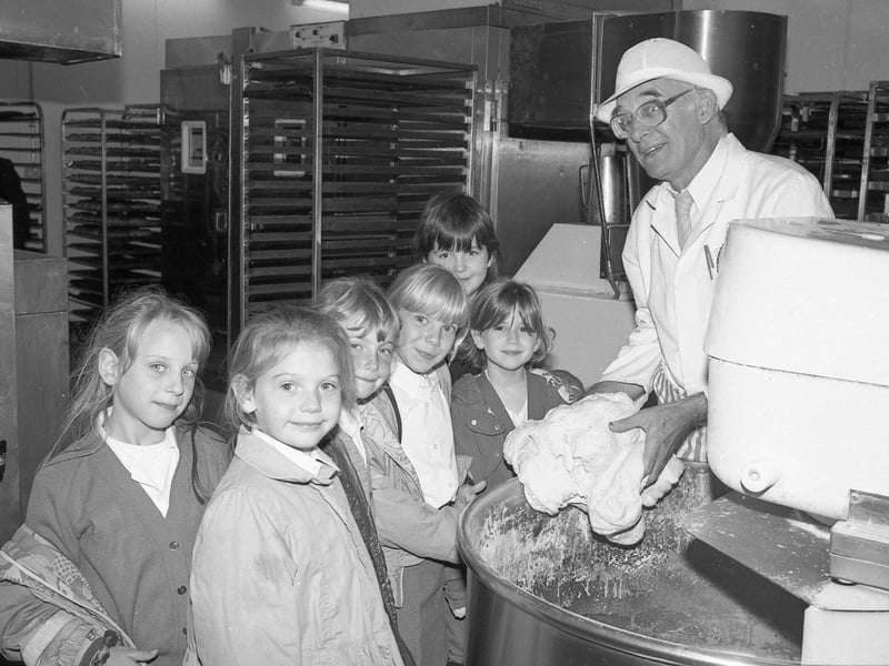 Asda deputy bakery manager Charlie Broughton with Carlton Road pupils.