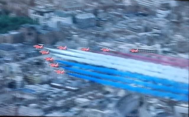 The Red Arrows fly over London during the Jubilee flypast.