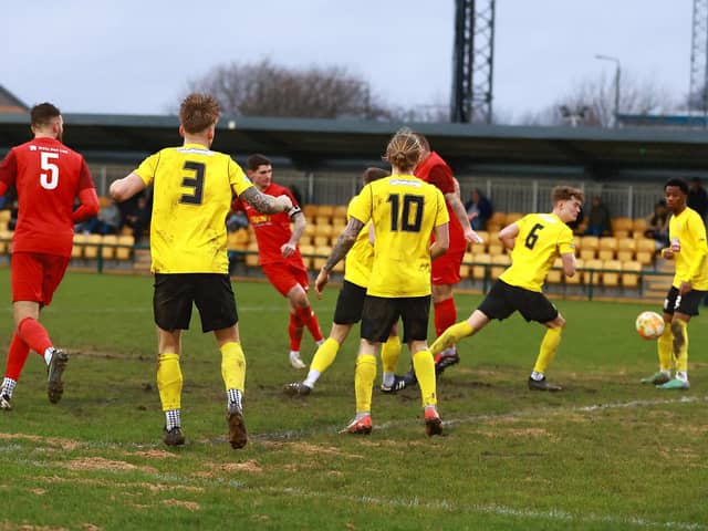 Charlie Ward fires home Sleaford's second goal at Hucknall. Photo: Steve W Davies Photography.
