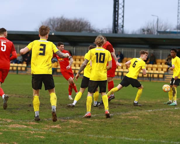 Charlie Ward fires home Sleaford's second goal at Hucknall. Photo: Steve W Davies Photography.