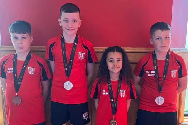 Pictured are Scorpion quartet Noah Clark, Cody Glen, Lyla Newman and Matthew Ayris.