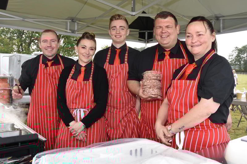 Rick, Sam and their team were busy with hot dogs, bacon and burgers.