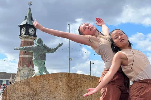 A contemporary dance called Mayfly by Kapow has audiences in Compass Gardens captivated. Photo: John Byford