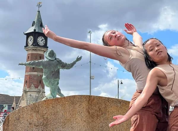 A contemporary dance called Mayfly by Kapow has audiences in Compass Gardens captivated. Photo: John Byford