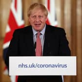 LONDON, ENGLAND - MARCH 12: British Prime Minister Boris Johnson holds a news conference addressing the government's response to the coronavirus outbreak on March 12, 2020 in London, England. (Photo by Simon Dawson-WPA Pool/Getty Images)