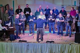 Members of the 'Men United' group singing at one of their training sessions in Louth.