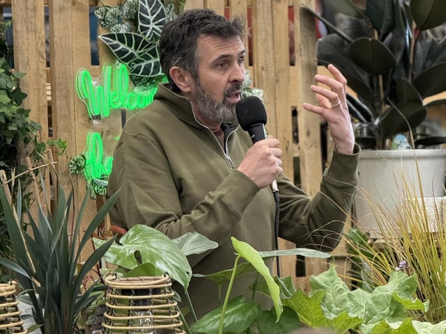 Adam Frost gives a talk to keen garden centre visitors.