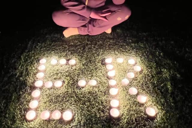 A tealight reflection from a 1st Horncastle Brownie.