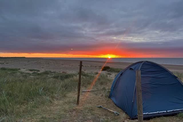 A photo Mike Watts took of his shorebird warden tent at sunrise.